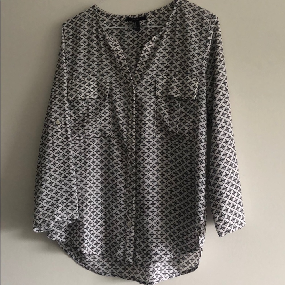 White button blouse with black design